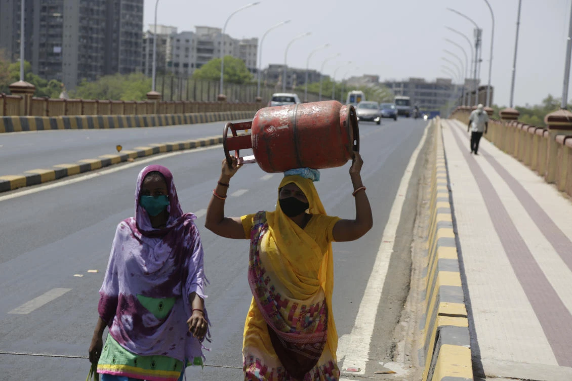 Ahmedabad accounts for 343 of the almost 2,000 coronavirus deaths reported nationwide. Above, residents walk on deserted bridge across River Sabarmati in Ahmedabad on Saturday, May 9, 2020. (AP)