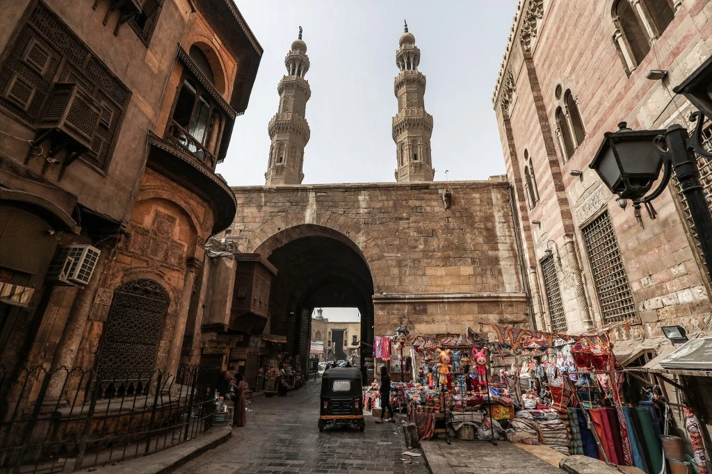 Above, a view of the area around Bab Zuweila, one of the remaining gates in the walls of the old medieval city of Cairo on April 24, 2020. (AFP)