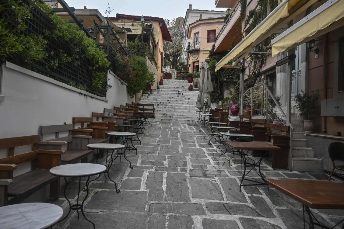 Above, closed cafes and taverns at the Plaka district, usually popular with tourists from all over the world, on April 14, 2020 hit Airbnb accommodations emptied of their clientele. (AFP)