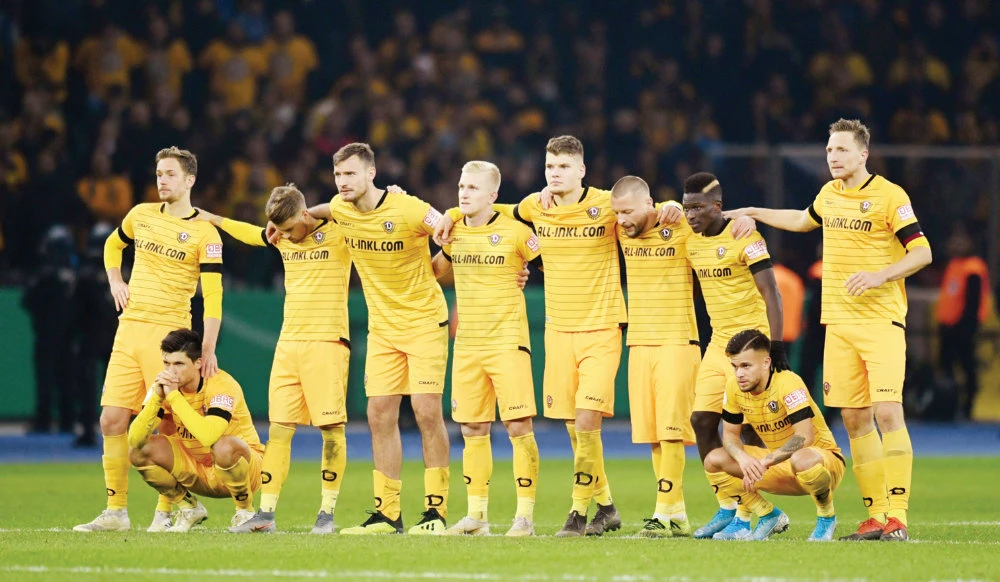 Dynamo Dresden players during the penalty shootout against Hertha BSC in the DFB Cup on Oct. 30. 2019. (Reuters File Photo)