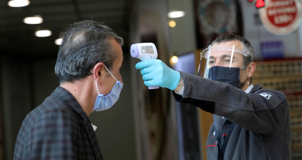Coronavirus restrictions have piled pressure on Turkey’s fragile economy, pushing the national currency to a record low. (AP)