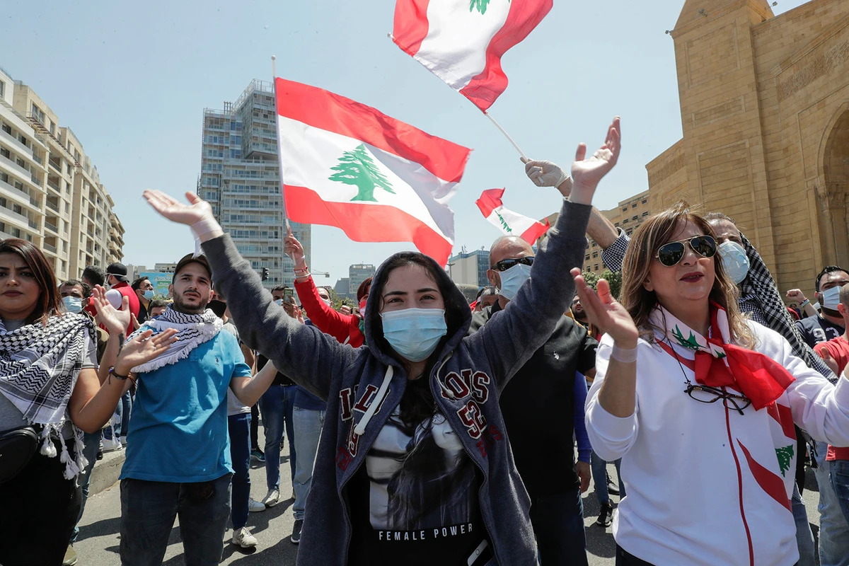 Lebanese anti-government protesters during a demonstration in Beirut against the growing economic crisis, May 1, 2020. (AFP)
