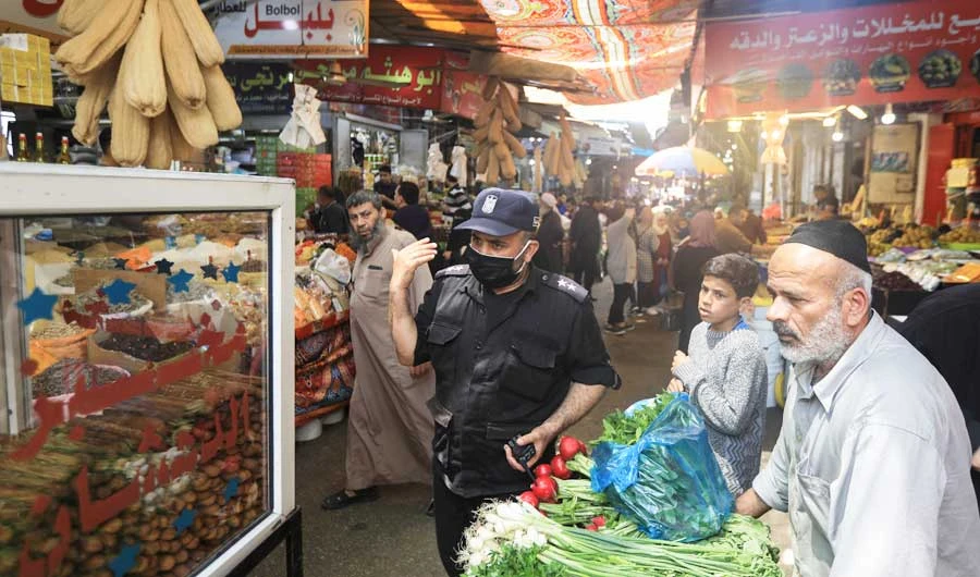 The market of Zawiya is doubly important in Ramadan, becoming a main destination for people breaking their fast. (AFP)