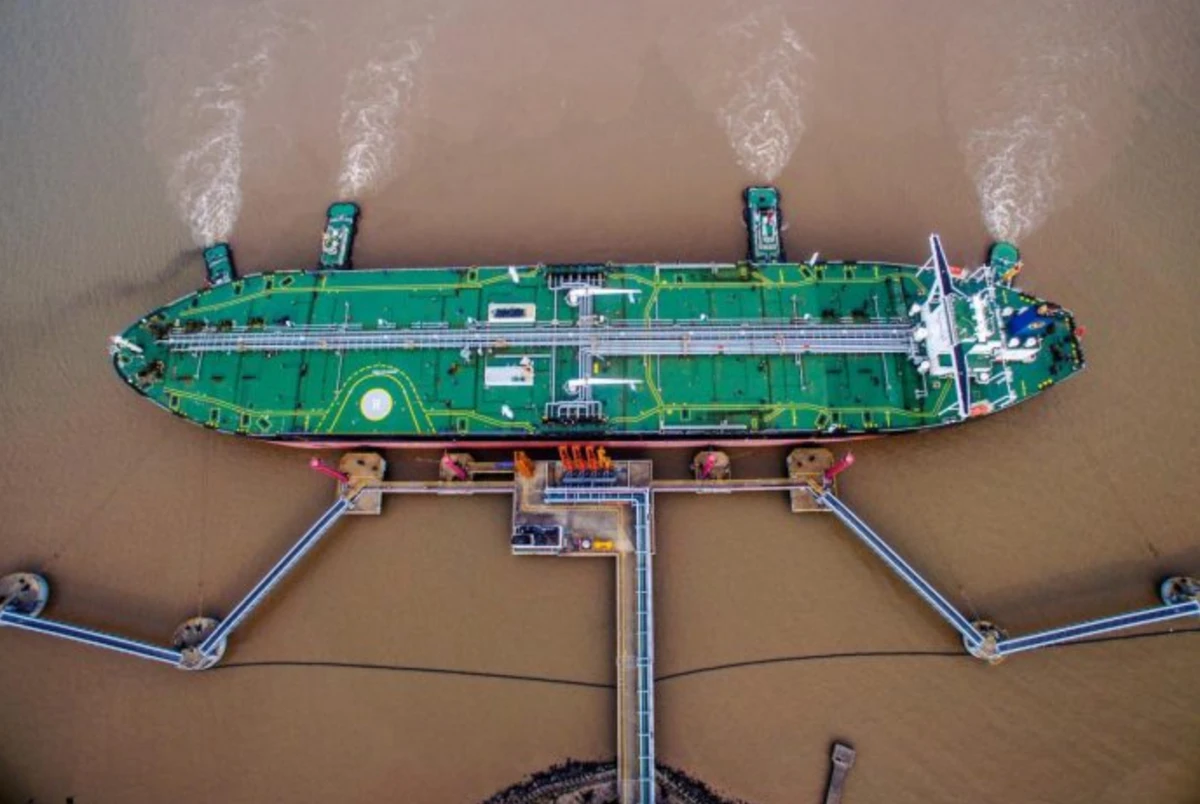 A tanker unloads crude oil at a terminal in China in July 2018.( REUTERS/ File photo)