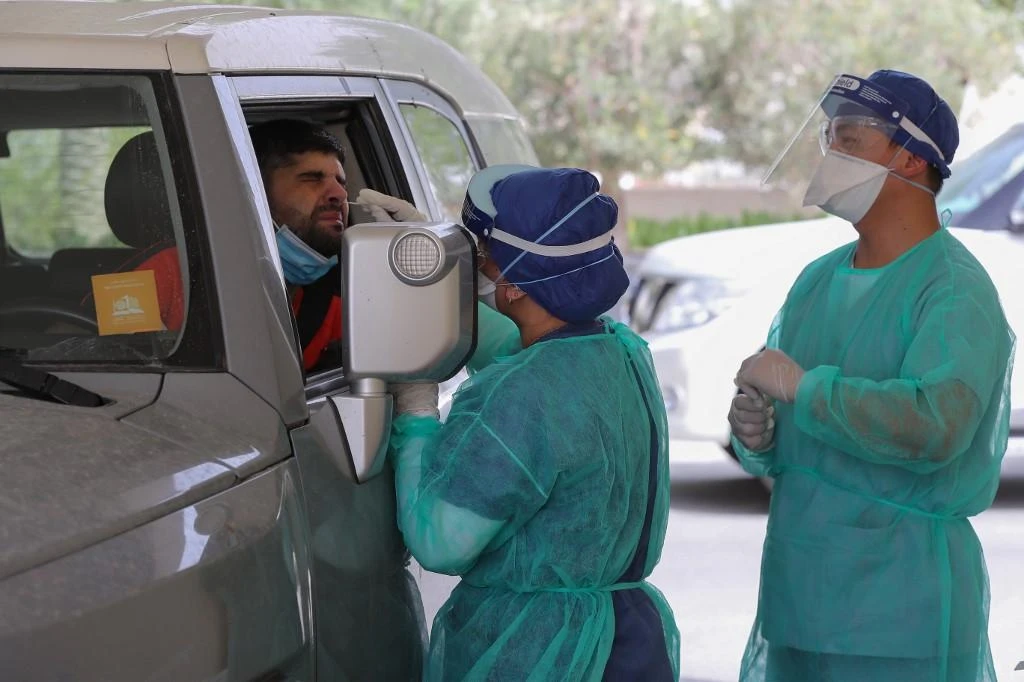 Qatar, with a population of 2.75 million people, has seen a relatively high number of coronavirus cases. (AFP)