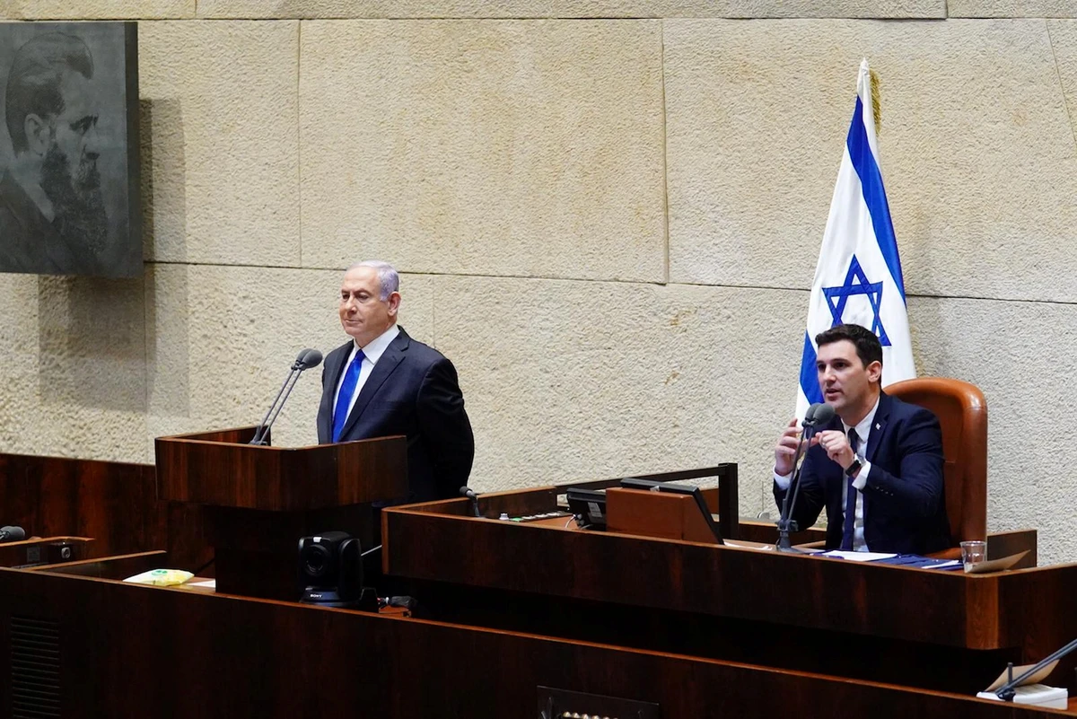 Israeli Prime Minister Benjamin Netanyahu speaks during a swearing in ceremony of his new unity government with election rival Benny Gantz, at the Knesset, Israel's parliament, in Jerusalem May 17, 2020. (Reuters)
