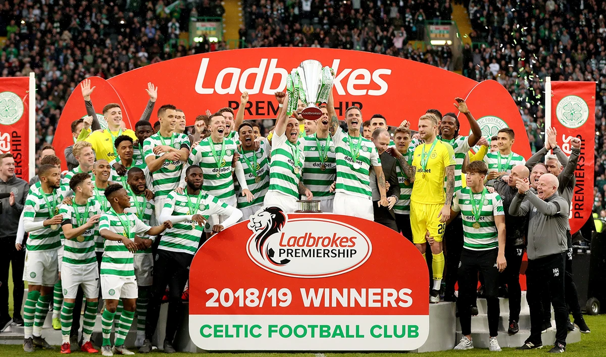 Celtic’s Scott Brown lifts the trophy as he celebrates winning the Premiership with teammates in this May 19, 2019 file photo. (Reuters)