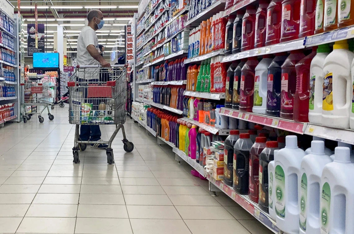 A man wearing a protective face mask in the disinfectant section of a Carrefour hypermarket, amid concerns over COVID-19, in the Cairo suburb of Maadi, Egypt, May 15, 2020. (Reuters)