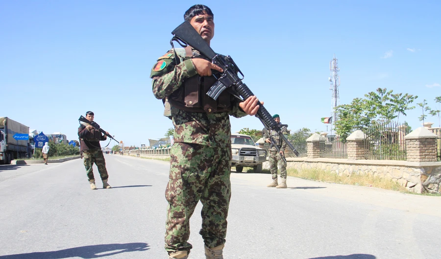Afghan National Army officers stand guard at the site of a blast in Ghazni province, Afghanistan May 18, 2020. (REUTERS)