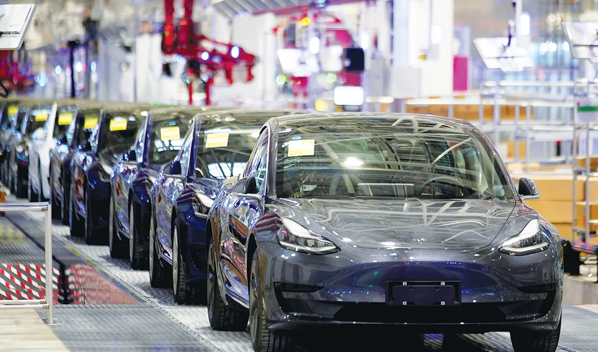 Tesla plans to introduce a new low-cost, long-life battery in its Model 3 sedan in China. (Reuters)