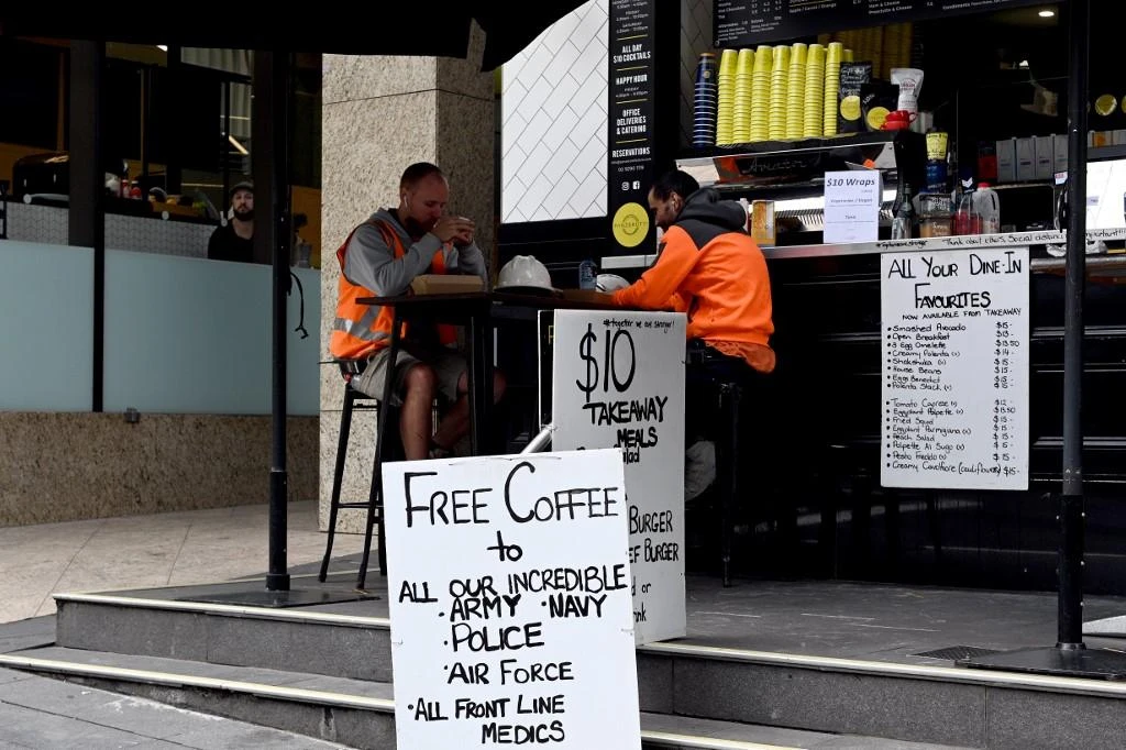 New South Wales will allow cafes, restaurants and pubs to have up to 50 seated patrons as efforts to revive the stalled Australian economy pick up pace. (AFP)