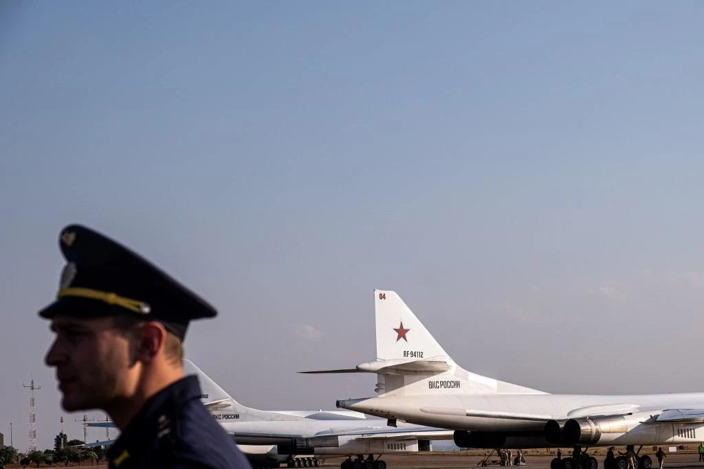 Above, two Russian Air Force Tupolev Tu-160, which are supersonic variable-sweep wing heavy strategic bombers, at the Waterkloof Air force Base in Centurion, South Africa in this October 23, 2019 photo. (AFP)