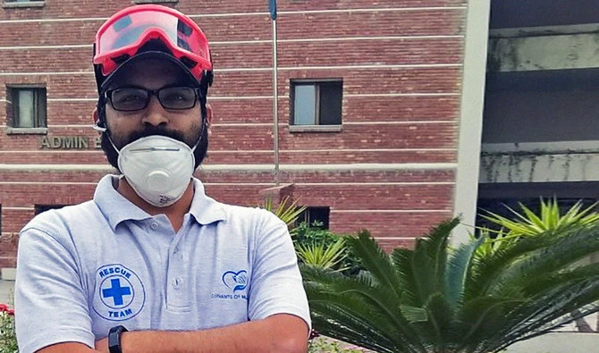 Syed Mustafa Ahmed, who should have been on PIA flight PK-8303, seen here in Lahore during a coronavirus rescue and relief effort on May 8, 2020. (Photo courtesy: Syed Mustafa Ahmed)