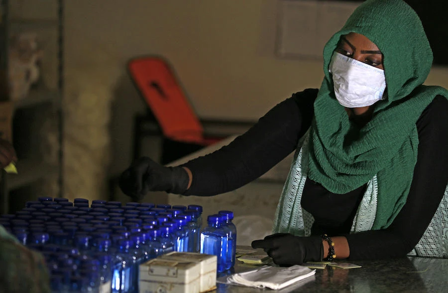 Sudanese medical laboratory students prepare sterilisers to combat the spread of the coronavirus COVID-19, on April 14, 2020 in Khartoum. (File/AFP)
