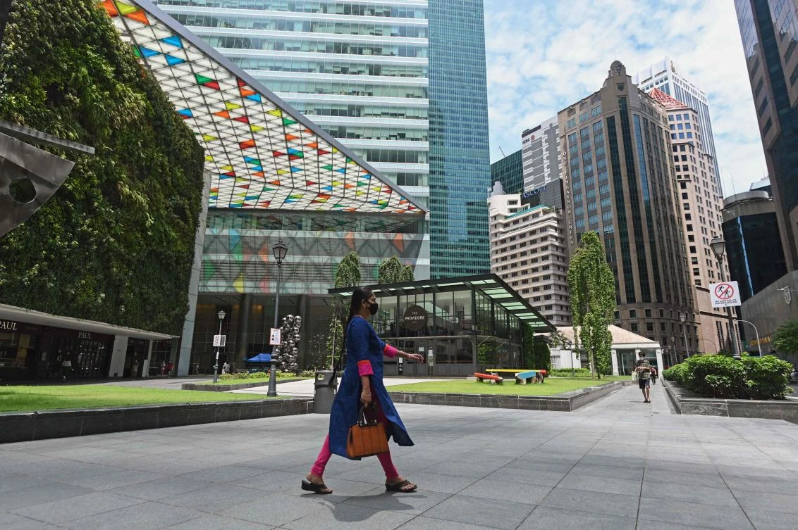 Above, the central business district in Singapore on May 22, 2020. Majority of the newly infected people in the city-state are migrant workers. (AFP)