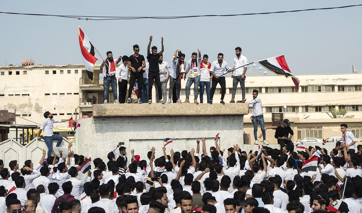 In this photo taken on Oct. 28, 2019, Iraqi students gather during a protest in support of Iraq’s anti-government demonstrations in the southern city of Basra. (AFP)
