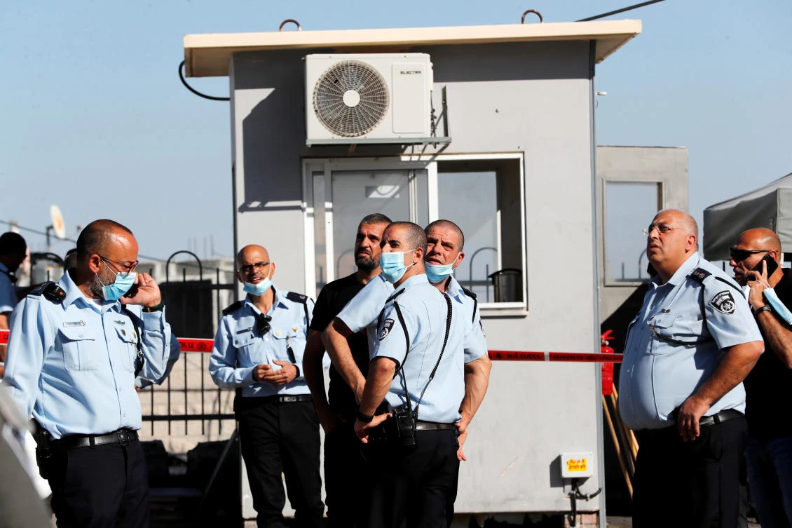 Israeli police officers look on at the scene of a suspected stabbing incident in Jerusalem May 25, 2020. (Reuters)