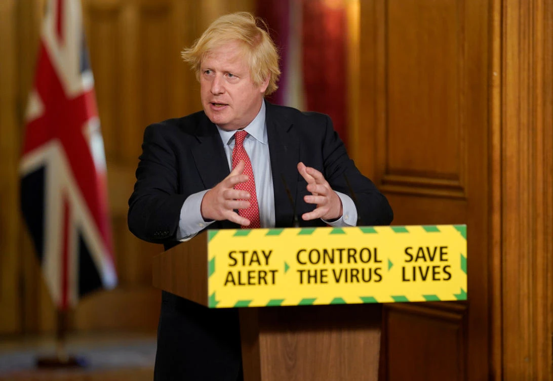 Britain's Prime Minister Boris Johnson holds a daily news conference with Public Health England's (PHE) Medical Director Yvonne Doyle (not pictured), on the coronavirus disease (COVID-19) outbreak, at 10 Downing Street. (Reuters)