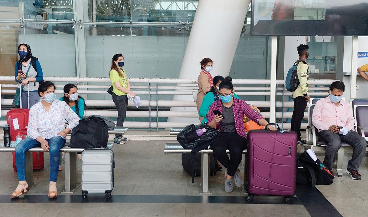 Passenger at the Kamaraj domestic airport’s boarding area during the first day of resuming of flights after the government imposed a nationwide lockdown. (AFP)