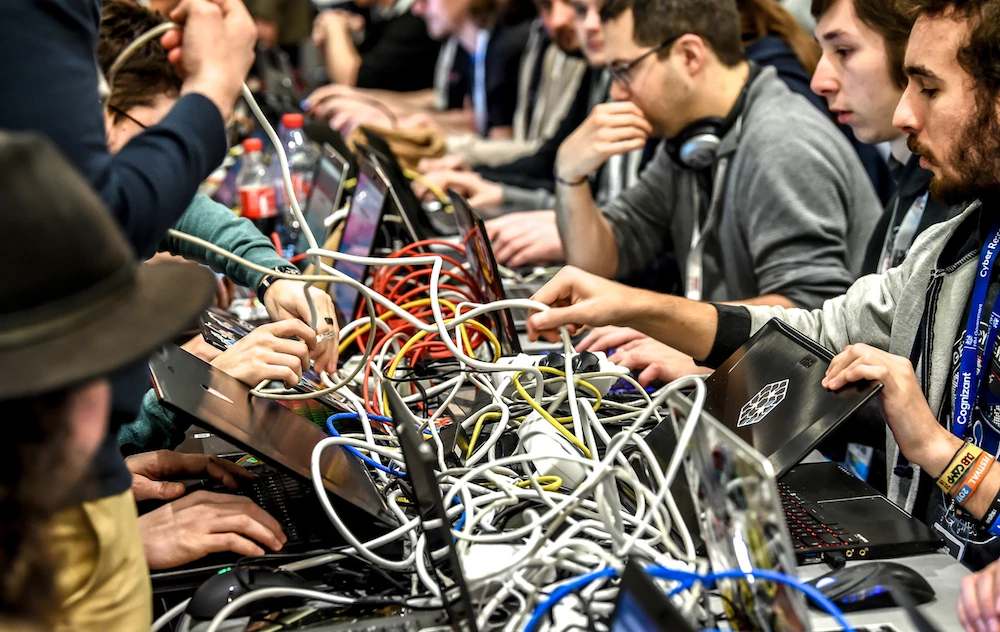 People work on computers on January 22, 2019 in Lille, during the 11th International Cybersecurity Forum. (AFP/File Photo)