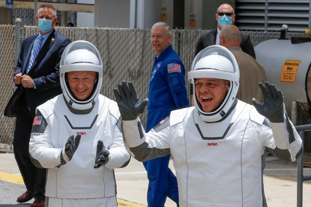 NASA astronauts Douglas Hurley and Robert Behnken head to launch Pad39A to board a SpaceX Falcon 9 rocket during NASA's SpaceX Demo-2 mission to the International Space Station from NASA's Kennedy Space Center in Cape Canaveral. (Reuters)