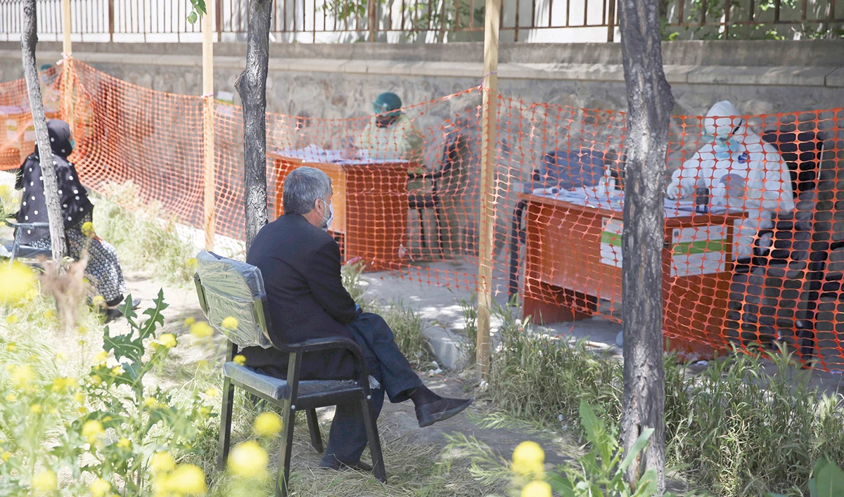 Afghan medical technicians screen patients about possible symptoms of the coronavirus at the Afghan-Japan Communicable Disease Hospital in Kabul. (File/AP)