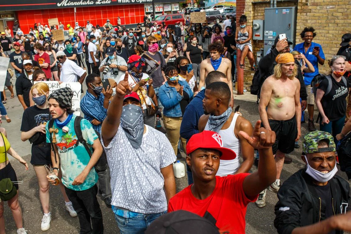 Protesters call for justice for George Floyd following his death outside the 3rd Police Precinct on May 27, 2020 in Minneapolis, Minnesota. (AFP)