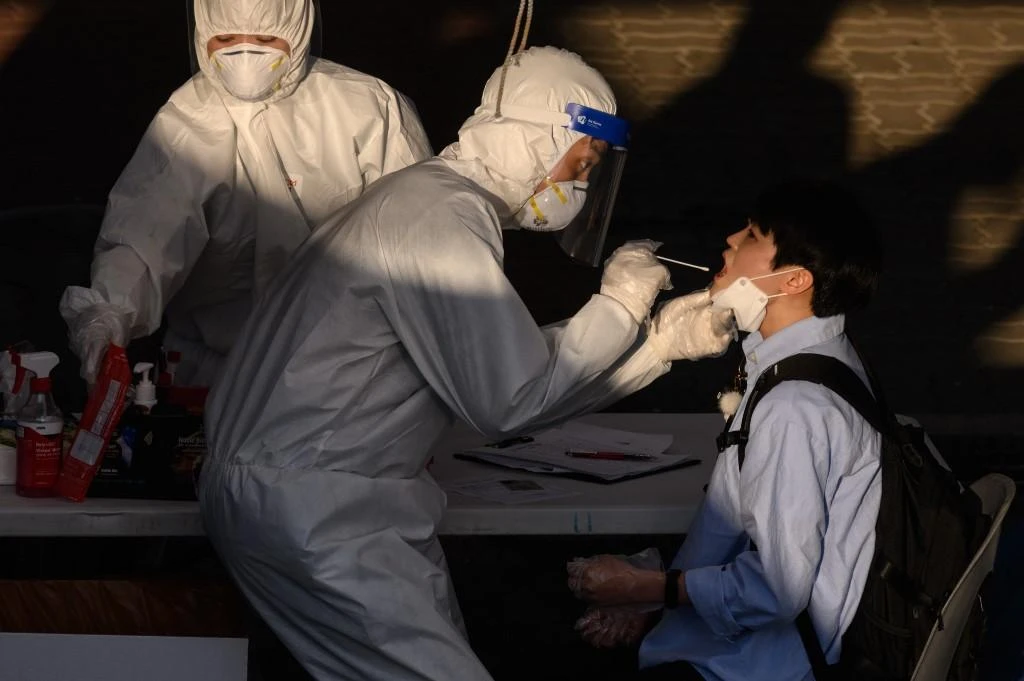 The country has been held up as a global model in how to curb the virus and has begun to ease restrictions, but is now rushing to contain new infections as life returns to normal. (AFP)