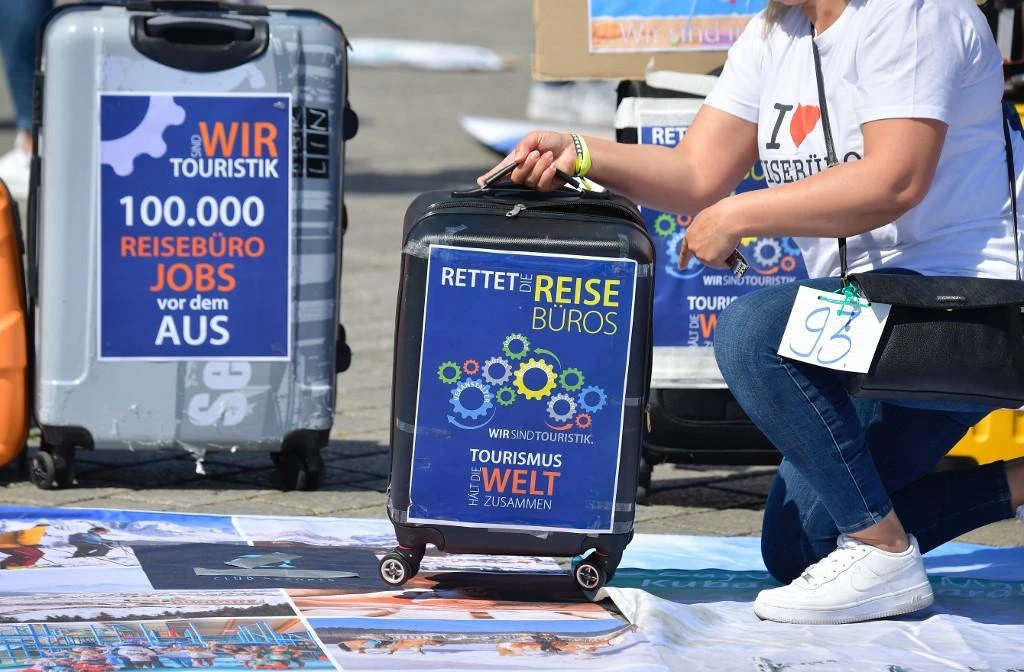 Germany was already teetering on the edge of recession before the coronavirus outbreak. Above, staff from bus operators and travel agencies call for rescue and state help on May 27, 2020 in Berlin. (AFP)