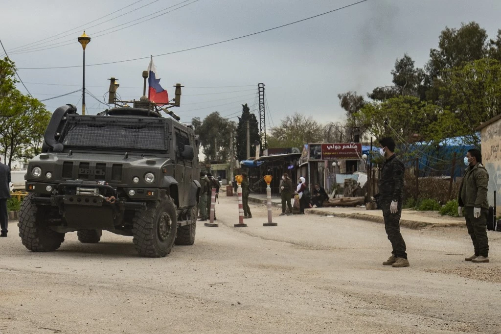A Russian military vehicle drives in the vicinity of Qamishli airport, which has been turned into a Russian military base, in Syria's northeastern Hasakeh province on April 5, 2020. (File/AFP)
