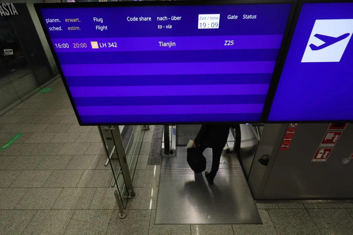 A screen shows Lufthansa flight LH 342 to Tianjin, China, the first post-lockdown flight departing Europe for China, at the Frankfurt airport on May 29, 2020. (AFP)