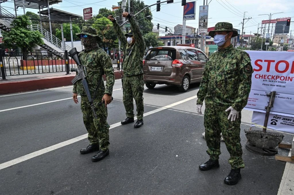 Philippine police made the mass arrests after spotting some of the suspects converging closely without face masks outside a rented apartment, in violation of quarantine restrictions. (AFP file photo)