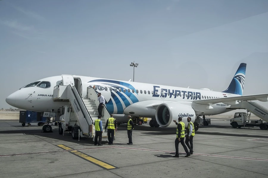 Repatriated Egyptians arrived from more than 36 countries globally after coordination between ministries and the tourism industry. (File/AFP)