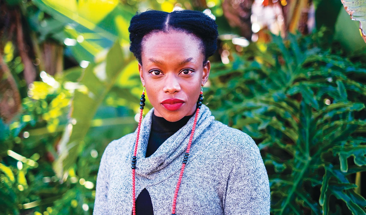 Tendaiishe Chitima poses for a portrait at her home in Sandton. (AFP)