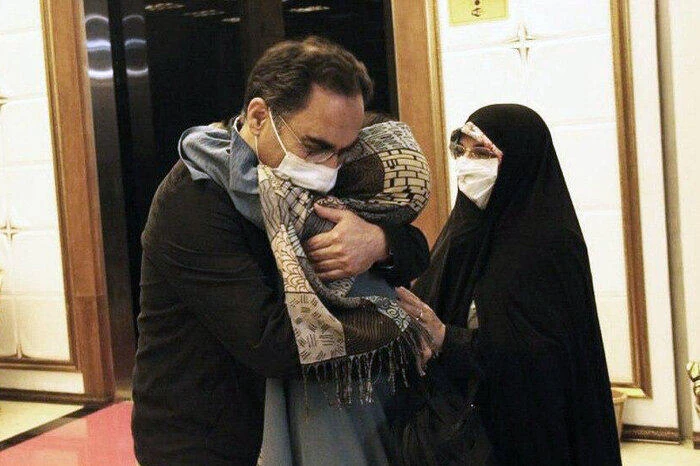 Above, Iranian professor Sirous Asgari being reunited with his family in Tehran on Wednesday, June 13, 2020. (IRNA)