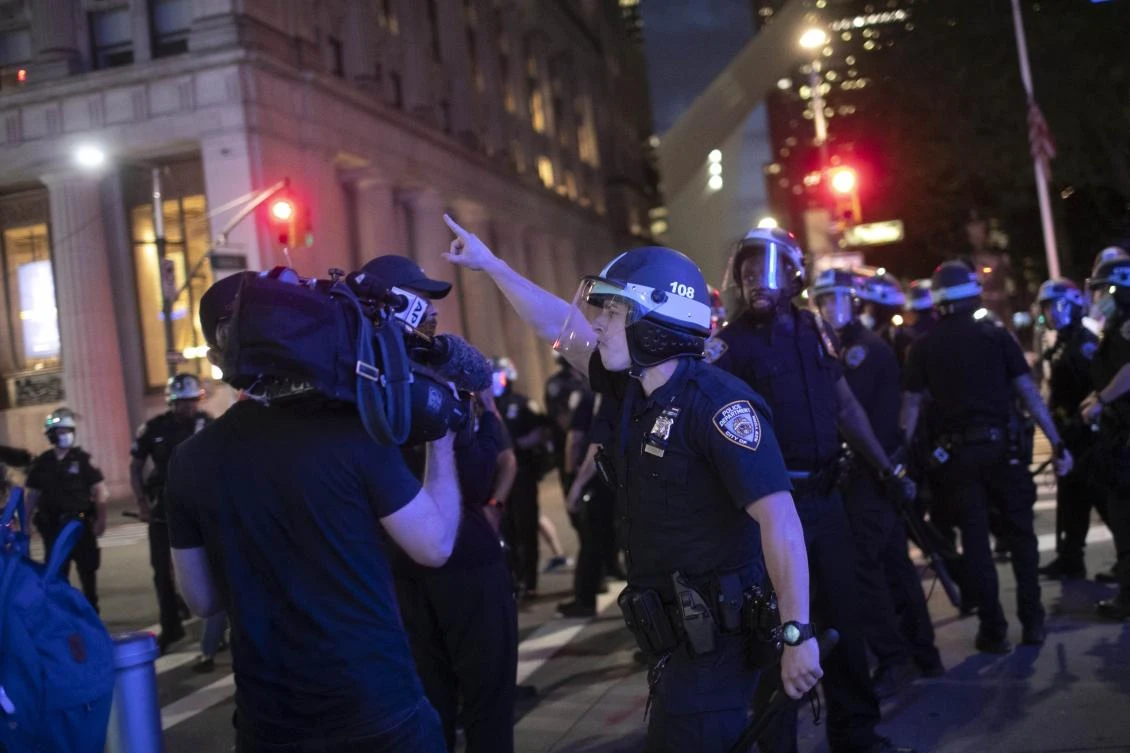 A police officer shouts at Associated Press videojournalist Robert Bumsted, Tuesday, June 2, 2020, in New York. (AP/Wong Maye-E)