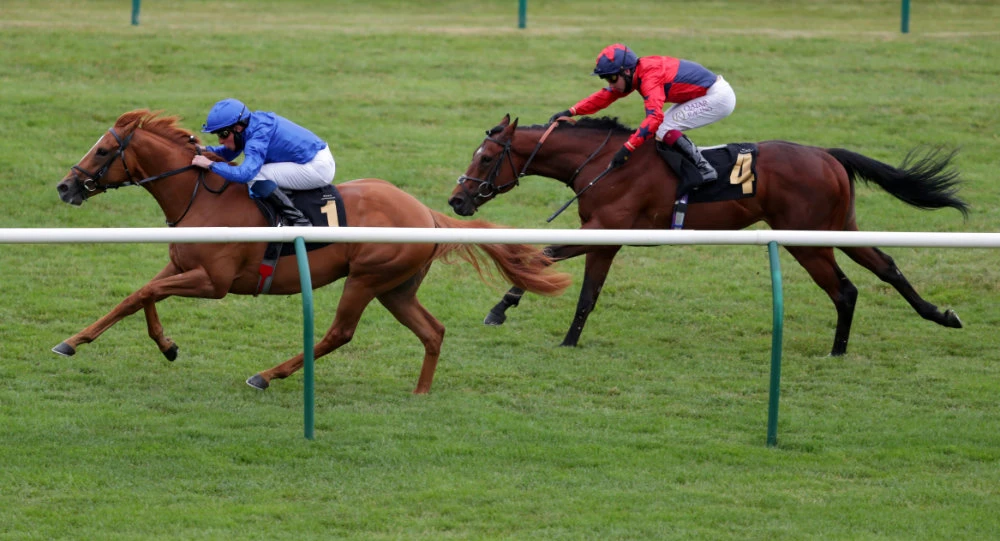 Creative Force ridden by William Buick goes on to win the Betway Maiden Stakes (Div 2) (Class 5) in Newmarket, Britain, as racing resumes behind closed doors following the outbreak of the coronavirus disease. (David Davies/Pool via REUTERS)