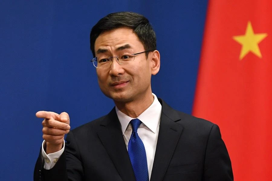 Chinese Foreign Ministry spokesman Geng Shuang takes a question during the daily press briefing in Beijing on March 18, 2020. (File/AFP)