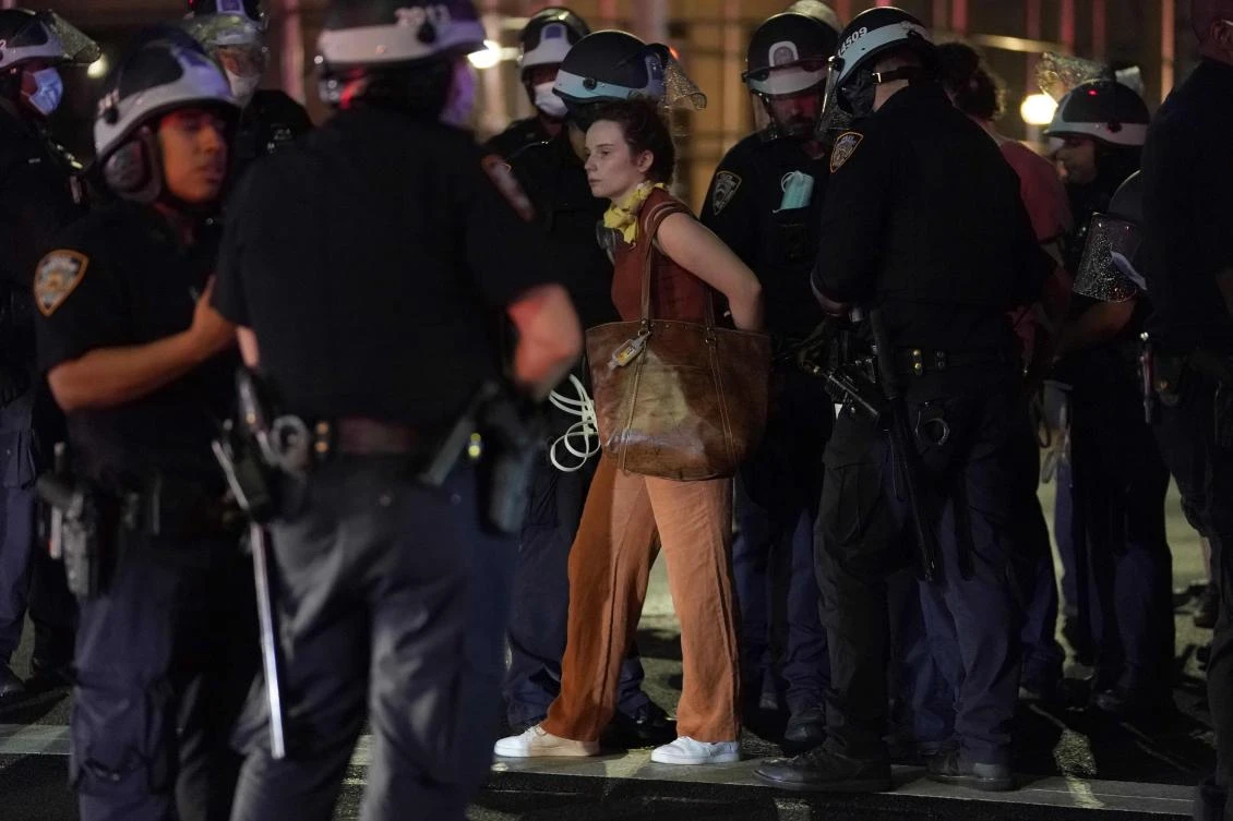 Protesters are arrested on Park Avenue in New York City on June 5, 2020 as they defy the 8 p.m. curfew while protesting the death of George Floyd. (AFP)