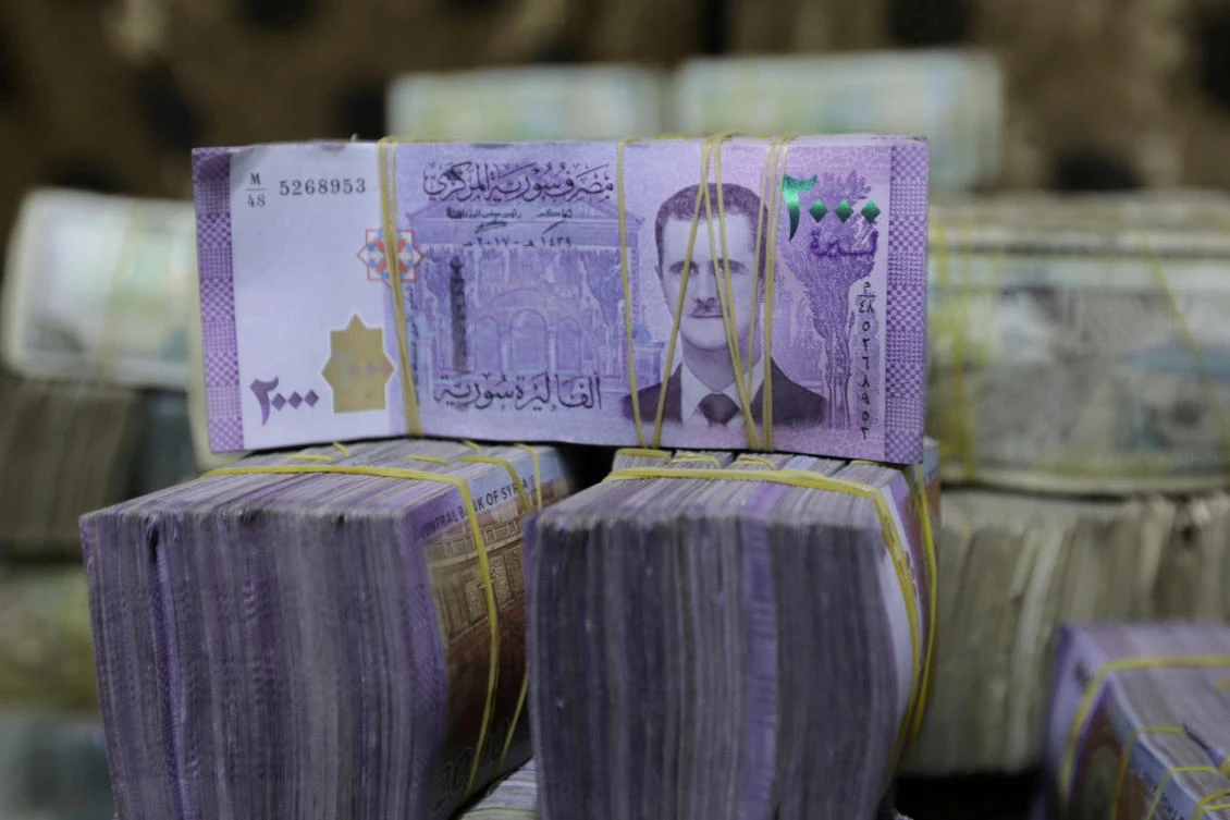 Syrian pounds are pictured inside an exchange currency shop in Azaz, Syria. (File/Reuters)