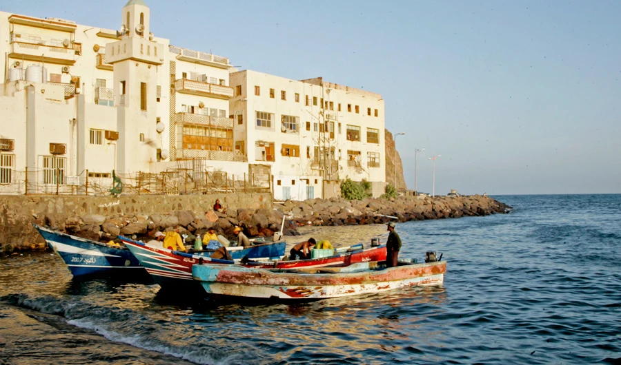 Fishermen work on their boats in the southern city of Aden, Yemen, in this file photo taken on March 18, 2015. (AP)
