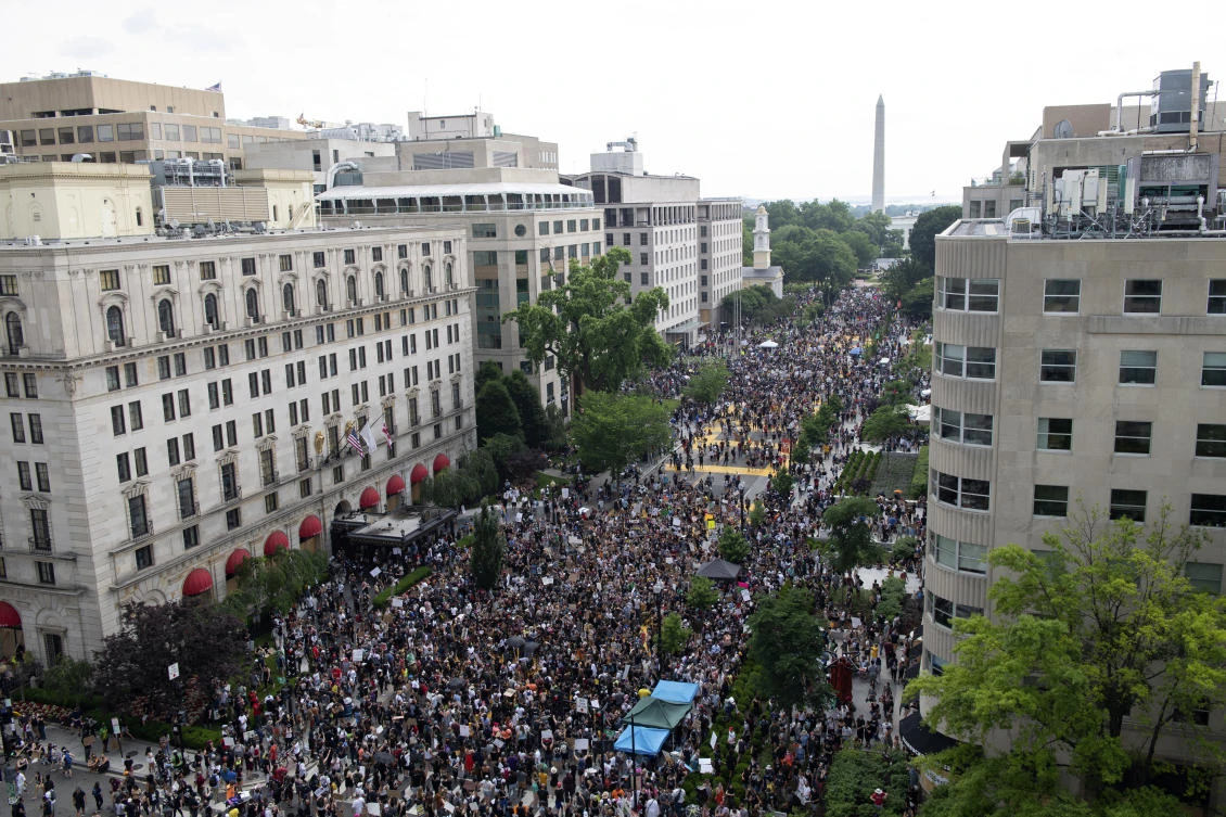 The Washington Monument and the White House are visible as protesters gather Saturday, June 6, 2020, in Washington. (AP)