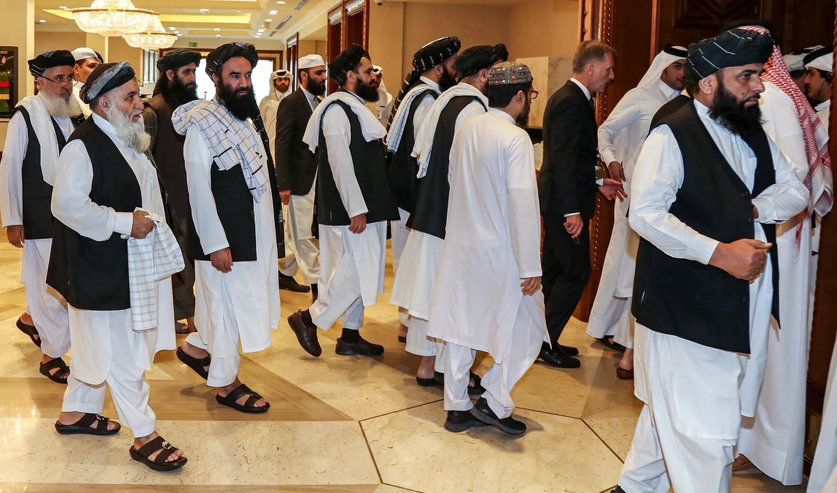 In this file photo, members of the Taliban arrive to attend the Intra Afghan Dialogue talks in Doha on July 7, 2019. (AFP)