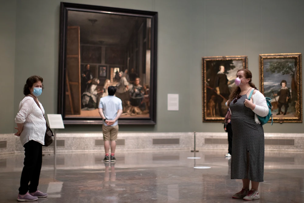 Visitors during the reopening of the Prado museum to the public in Madrid, Spain, Saturday, June 6, 2020. (AP)
