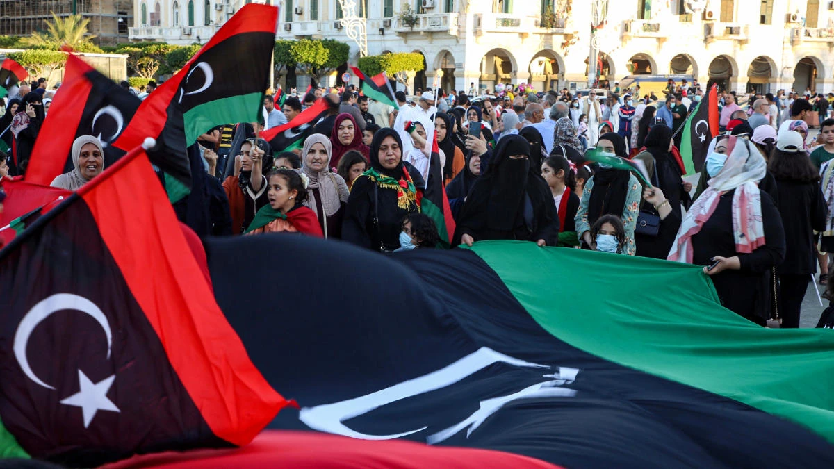 People gathered in Martyrs Square in the centre of Tripoli following news that the GNA had regained control of the capital. (AFP)