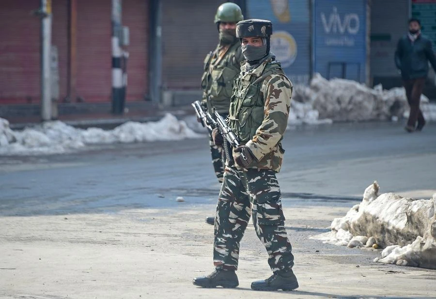 Indian paramilitary troopers stand guard during a one-day strike called by Kashmiri separatists to mark the death anniversary of Jammu and Kashmir Liberation Front (JKLF) founder Maqbool Bhat in Srinagar on February 11, 2019. (File/AFP)