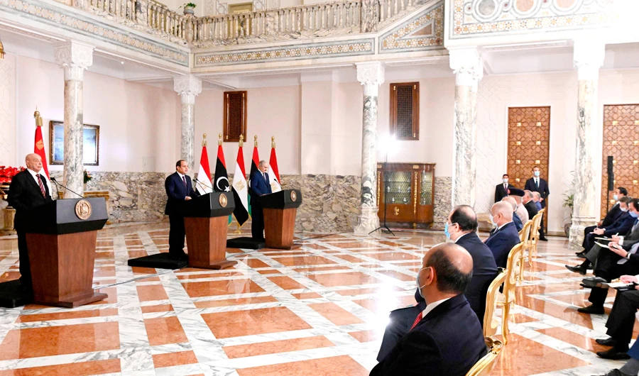 A handout picture released by the Egyptian Presidency on June 6, 2020 shows Egyptian President Abdel Fattah al-Sisi (2nd-L), Libyan commander Khalifa Haftar (3rd-L) and the Libyan Parliament speaker Aguila Saleh (L) taking part in a joint press conference in the capital Cairo. (AFP)
