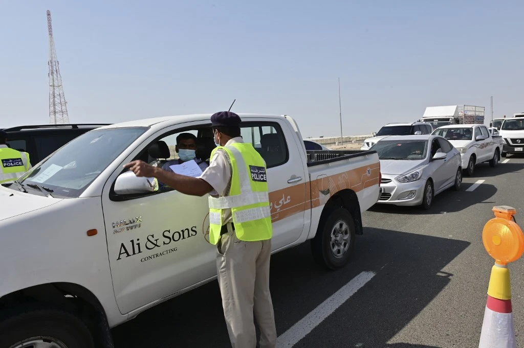 Emirati security forces man a checkpoint at the entrance of Abu Dhabi. (AFP)