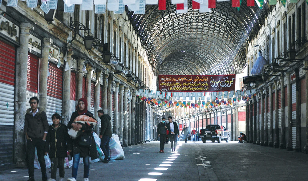 The Hamidiyah souk in the old city of Syria’s capital Damascus, where the shops have been closed due to the COVID-19 lockdown. (AFP)