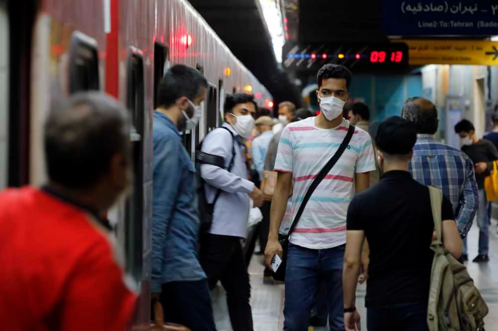 Iranians are pictured at a metro station in the capital Tehran on June 10, 2020 amid the coronavirus Covid-19 pandemic crisis. (AFP)